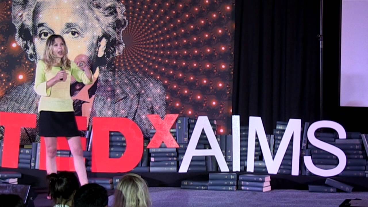 Robyn Farah talking at TED-X AIMS